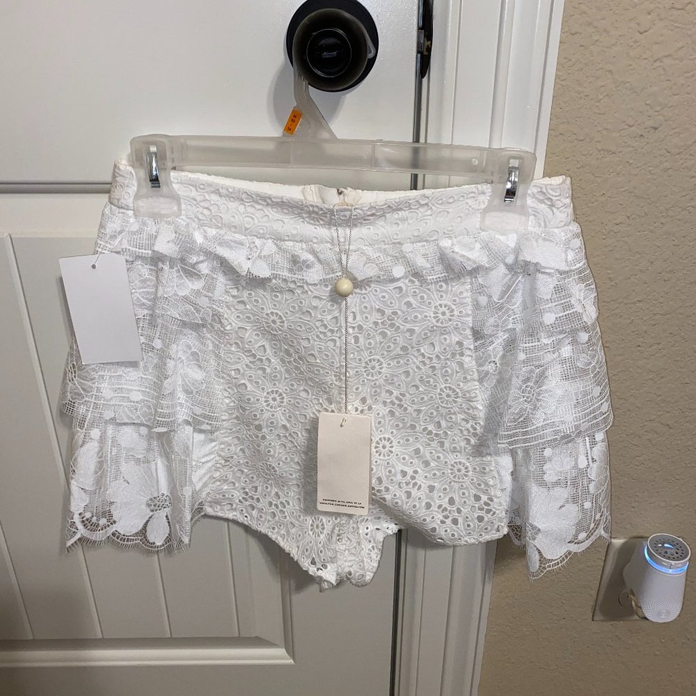 Never worn before: For Love and Lemons white lace shorts